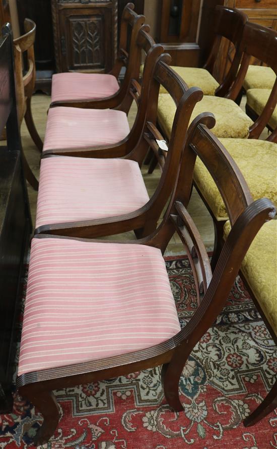 A set of four Regency style dining chairs